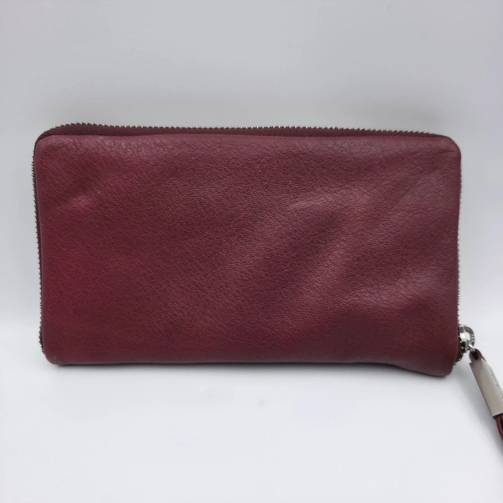 Perlina New York Burgundy Leather Zip Around Wallet Leopard Print Interior